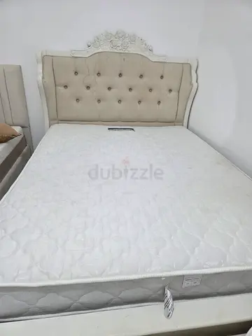Elegant Queen Size Bed with Luxurious Headboard