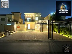 Luxury villa for sale in Al Muwaihat, Ajman, with a swimming pool, price includes electricity, water