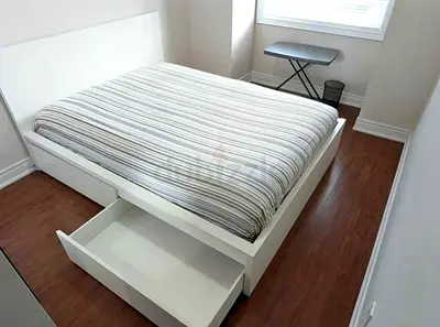 IKEA malam king‑size bed (180 × 200 cm) with 2 storage drawers underneath and an IKEA mattress