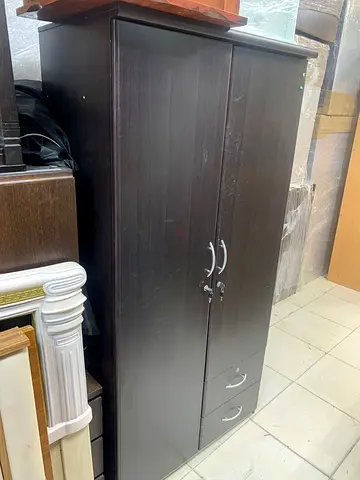 Elegant Dark Wooden Wardrobe with Drawers