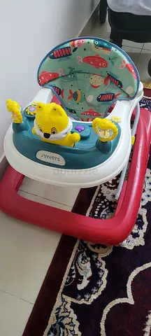 Brightly Colored Baby Jumper for Fun Playtime