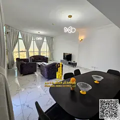 With an open view, a furnished two-bedroom apartment with a living room is available for monthly ren