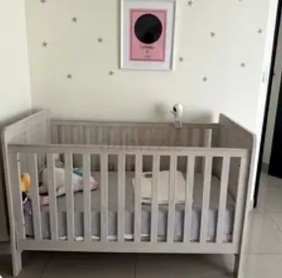 Minimalist Grey Crib for Your Little One