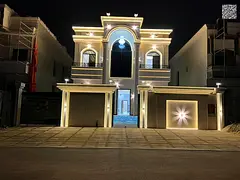 The most luxurious villas in Ajman with a sophisticated classic design, two floors and a roof, at a