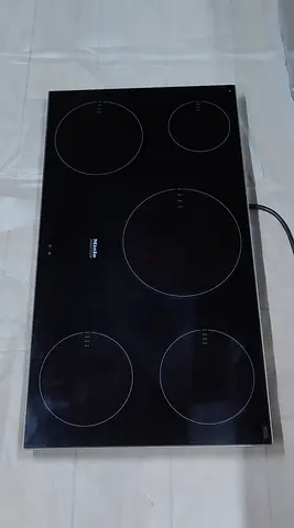 Miele built-in induction cooktop.  Excellent condition perfect working  new model