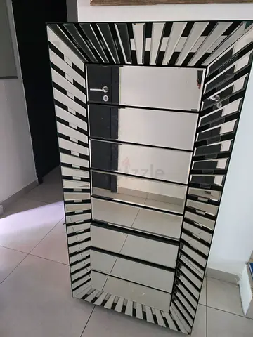 Sleek glass Cabinet with Mirror Finish