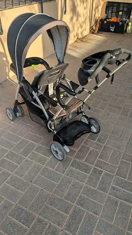 Price reduced!! Double Stroller with Cup Holders, Sun Shade, and Reclining Seat