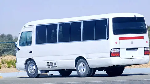 Toyota Coaster // Gcc space // Full seats // Model 2003