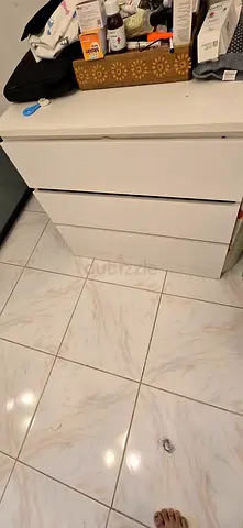 Stylish White 4-Drawer Cabinet for Organized Living