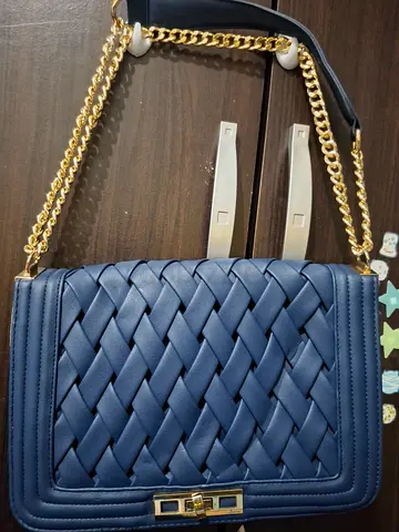 Versace Stylish Woven Blue Handbag from U.S.