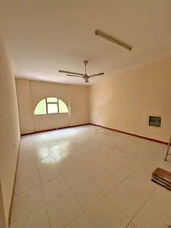 💯 Annual Rent in Ajman 💦 Two-bedroom apartment with a living room, two bathrooms, and a kitche