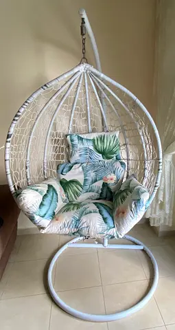 Hanging swing chair with cushions