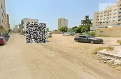 Land for sale in Liwara 1 Ajman 7,684 sqm G+4 zoning prime location ideal investment