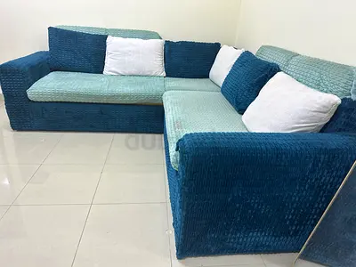 Comfortable L-Shaped Sofa in Soft Blue Fabric