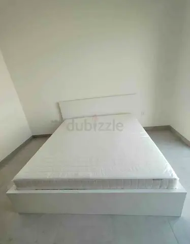 IKEA malam king‑size bed (180 × 200 cm) with 2 storage drawers underneath and an IKEA mattress