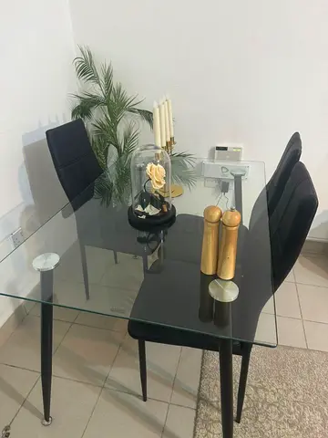 Modern Glass Dining Table with Stylish Chairs