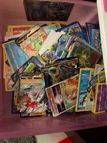 A lot of Pokémon cards ( some are fake some are real