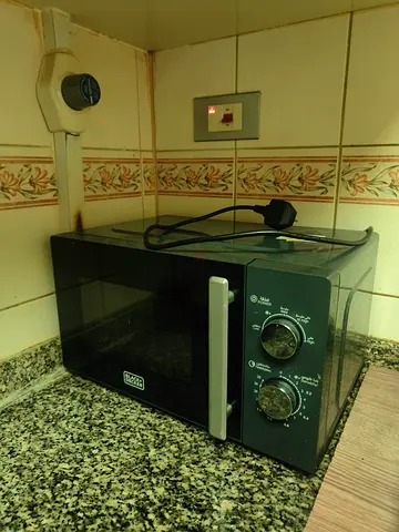 Compact Black Microwave for Quick Meals