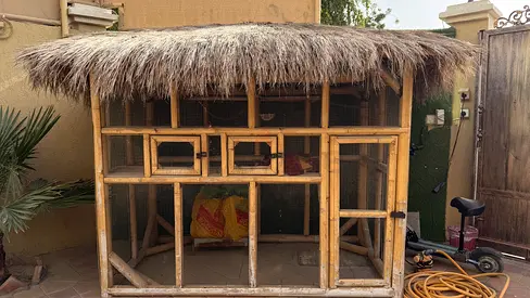 قفص خشبي من البامبو للطيور