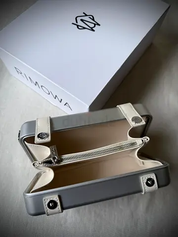 Men Rimowa messenger bag