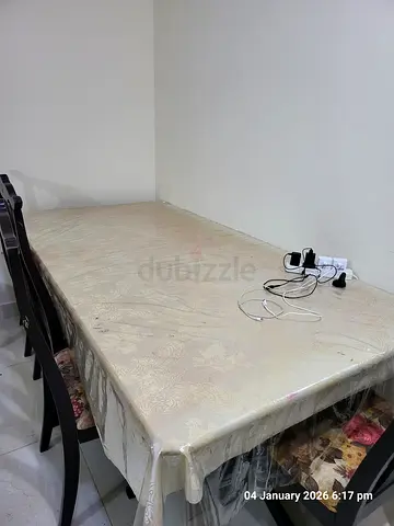 DINING TABLE WITH FREE CHAIRS