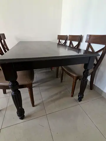 Elegant Black Dining Table with Classic Chairs
