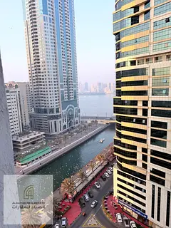 Charming 2 BR Apartment in Al Majaz 3 with Water Views