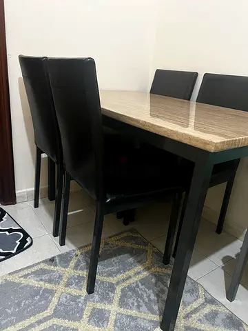Two dining tables with 8 chairs included
