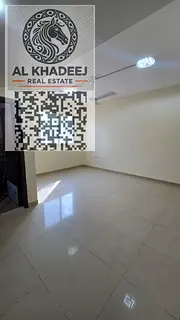 A distinctive studio apartment for annual rent, spacious with a separate kitchen, in Al Jurf Industr