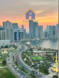 Two bedrooms and a living room with a parking space for sale in Al Majaz 2