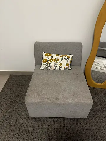 Comfortable Gray Chaise Lounge with Decorative Cushion