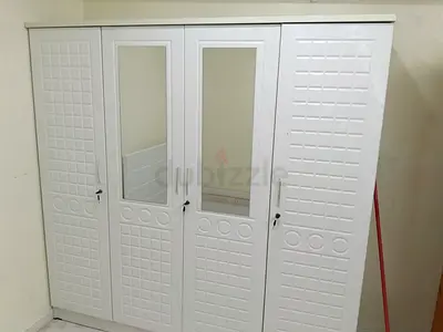 Sleek Four-Door Wardrobe with Mirrors