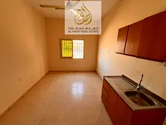 Al Muwaihat 3, near the Dubai and Sharjah exit - Studio apartment for annual rent, good size - 18,00