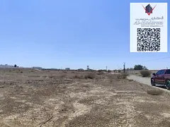 Three Residential land side by side for sale in Ajman - Al Manama 14, On the asphalt road.