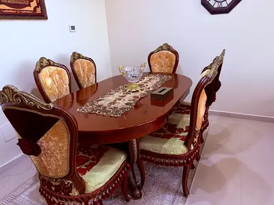 Elegant Dining Set with Intricate Design