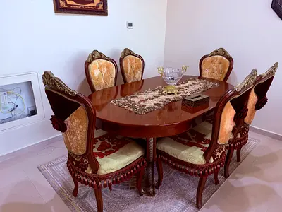 Elegant Vintage Dining Set with Ornate Chairs