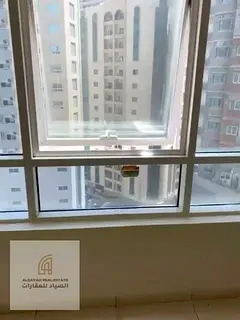 One-Bedroom Apartment with Living Room for Sale in Al Nahda