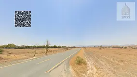 Land for sale in Al Manama 8, with a large area