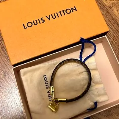Louis Vuitton Bracelet with Charm with inclusions