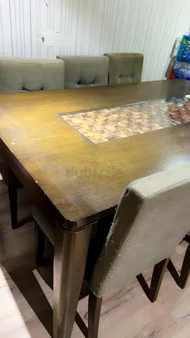 Stylish Dining Table with Comfortable Chairs