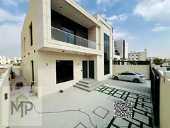 Own a luxury villa in Ajman with modern designs and spacious areas, strategic location, ownership fo