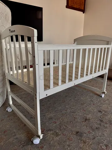Compact Baby Crib with Wheels and Mattress
