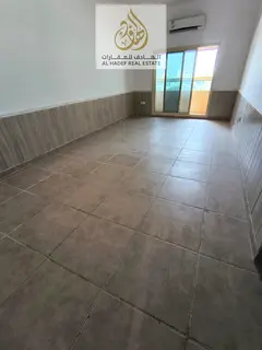 For rent in Ajman 🏠 A distinctive two-bedroom apartment with a living room, a spacious balcony 