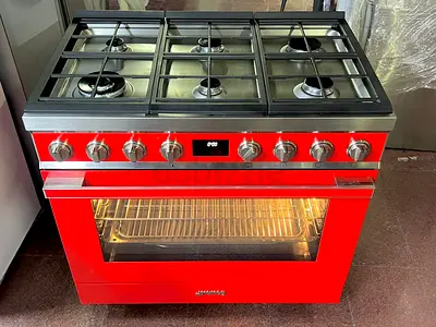 Smeg 6 burner Double oven gas with electric oven. Size 90-60cm