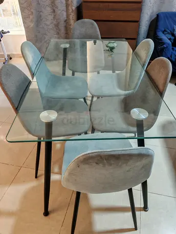 Stylish Glass Dining Table with Comfortable Chairs