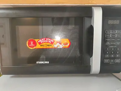 Nikai Microwave Oven - Quick and Easy Cooking!