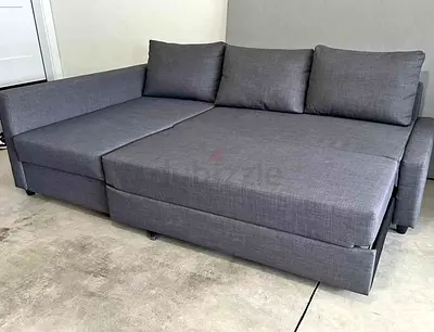 Ikea L Shape Sofa cum bed with big storage in L