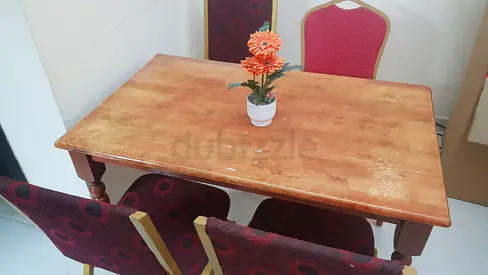 Solid Wooden Dining Table with Elegant Chairs IN AJMAN