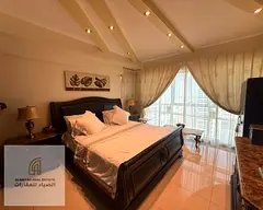 Elegant 3 BR Apartment in Al Majaz 3: Serene Living