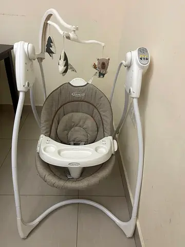 Gentle Baby Swing with Soothing Sounds